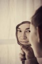 Pretty Girl Looking in Mirror Royalty Free Stock Photo