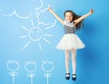 Pretty girl making drawings on the wall Royalty Free Stock Photo