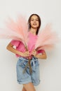 pretty girl pink pampas posing light background