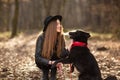 Pretty girl playing and having fun with her pet by name Brovko Vivchar Royalty Free Stock Photo