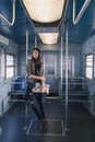 Pretty girl posing in a metro car Royalty Free Stock Photo