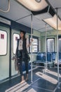 Pretty girl posing in a metro car Royalty Free Stock Photo