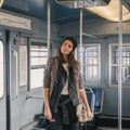 Pretty girl posing in a metro car Royalty Free Stock Photo