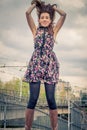 Pretty girl posing on railroad bridge Royalty Free Stock Photo