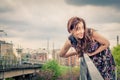 Pretty girl posing on railroad bridge Royalty Free Stock Photo