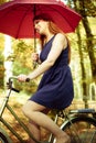 Pretty girl with red umbrella.