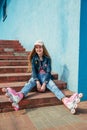 Pretty girl on roller skates in city Royalty Free Stock Photo