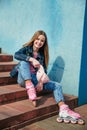 Pretty girl on roller skates in city Royalty Free Stock Photo
