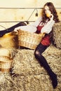 Pretty girl on straw bales Royalty Free Stock Photo