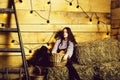 Pretty girl on straw bales Royalty Free Stock Photo