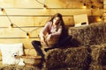 Pretty girl on straw bales Royalty Free Stock Photo