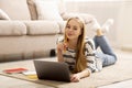 Pretty Girl Studying at Home, Using Laptop Royalty Free Stock Photo