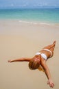 Pretty girl sunbathing on the beach Royalty Free Stock Photo