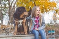 Pretty girl with tibetan mastiff on the nature Royalty Free Stock Photo