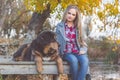 Pretty girl with tibetan mastiff on the nature Royalty Free Stock Photo