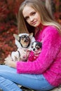 Pretty girl with two chihuahua dogs on the nature Royalty Free Stock Photo