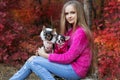 Pretty girl with two chihuahua dogs on the nature Royalty Free Stock Photo