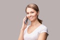 Pretty girl using cellphone. Woman holding mobile phone Royalty Free Stock Photo
