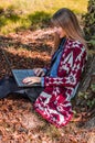 pretty girl using lap top in the park Royalty Free Stock Photo