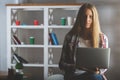 Pretty girl using laptop at workplace Royalty Free Stock Photo