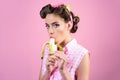 Pretty girl in vintage style. pin up woman with trendy makeup. pinup girl with fashion hair. banana dieting. retro woman Royalty Free Stock Photo