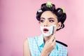 Pretty girl in vintage style. pinup girl with fashion hair. morning grooming and skincare. pin up woman with trendy Royalty Free Stock Photo