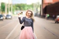 Pretty girl walking down the street Royalty Free Stock Photo