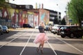 Pretty girl walking down the street Royalty Free Stock Photo