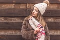 Pretty girl is wearing warm hat and scarf Royalty Free Stock Photo