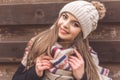 Pretty girl is wearing warm winter clothes Royalty Free Stock Photo