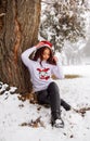 Pretty girl in winter forest, young woman in winter park Royalty Free Stock Photo