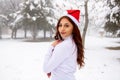 Pretty girl in winter forest, young woman in winter park Royalty Free Stock Photo