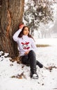 Pretty girl in winter forest, young woman in winter park Royalty Free Stock Photo