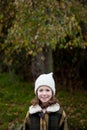 Pretty girl with wool hat in a park Royalty Free Stock Photo