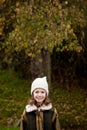 Pretty girl with wool hat in a park Royalty Free Stock Photo