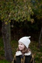 Pretty girl with wool hat in a park Royalty Free Stock Photo