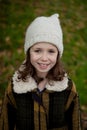 Pretty girl with wool hat in a park Royalty Free Stock Photo