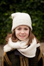 Pretty girl with wool hat in a park Royalty Free Stock Photo