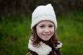 Pretty girl with wool hat in a park Royalty Free Stock Photo