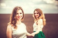 Pretty girls outdoor walking in the field Royalty Free Stock Photo