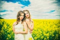 Pretty girls outdoor walking in the field Royalty Free Stock Photo