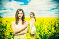 Pretty girls outdoor walking in the field Royalty Free Stock Photo