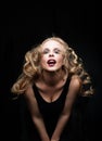 Pretty glamorous blonde fashion model woman with wind in the hair portrait Royalty Free Stock Photo