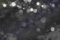 Pretty sparkling glitter lights defocused bokeh abstract background with falling snow flakes fly, festal mockup texture with blank