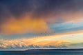 Pretty golden and blue cloudscape at dusk in Ramsgate, Thanet, Kent, UK looking across Sandwich Bay to Deal Royalty Free Stock Photo