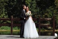 Gorgeous wedding couple. Wedding for two. Pretty bride and stylish groom