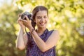 Pretty hipster taking a photo Royalty Free Stock Photo