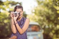 Pretty hipster taking a photo Royalty Free Stock Photo