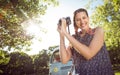 Pretty hipster taking a photo Royalty Free Stock Photo