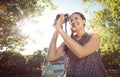 Pretty hipster taking a photo Royalty Free Stock Photo